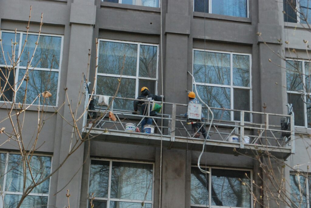 exterior contractors working on building